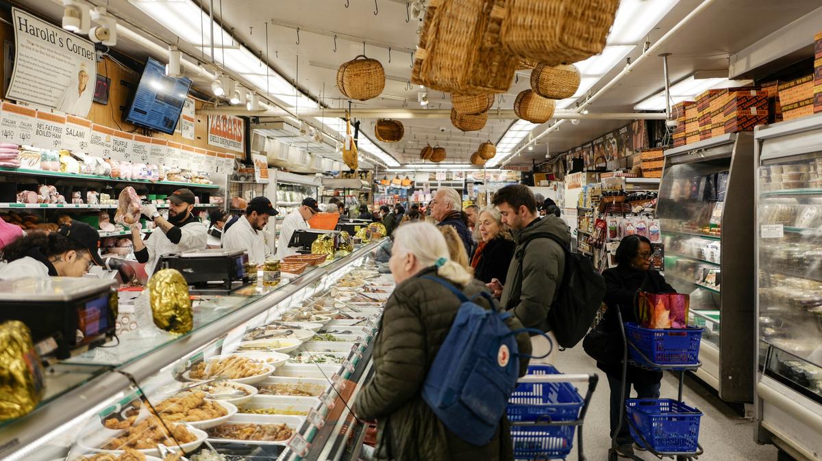 People shop at Zabar's supermarket in New York City, U.S., November 26, 2025. REUTERS/Jeenah Moon/File Photo