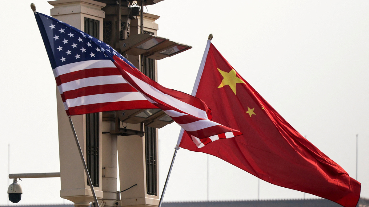 FILE PHOTO: U.S. and China’s national flags flutter in Tiananmen Square, ahead of U.S. President Donald Trump's visit to China, in Beijing, China, May 13, 2026. REUTERS/Maxim Shemetov/File Photo