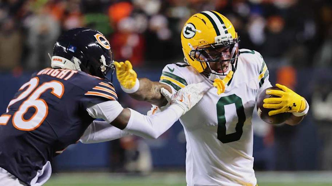  Dec 20, 2025; Chicago, Illinois, USA; Green Bay Packers wide receiver Matthew Golden (0) runs with the ball against Chicago Bears cornerback Nahshon Wright (26) during the first quarter at Soldier Field. Mandatory Credit: Mike Dinovo-Imagn Images | Mike Dinovo-Imagn Images 