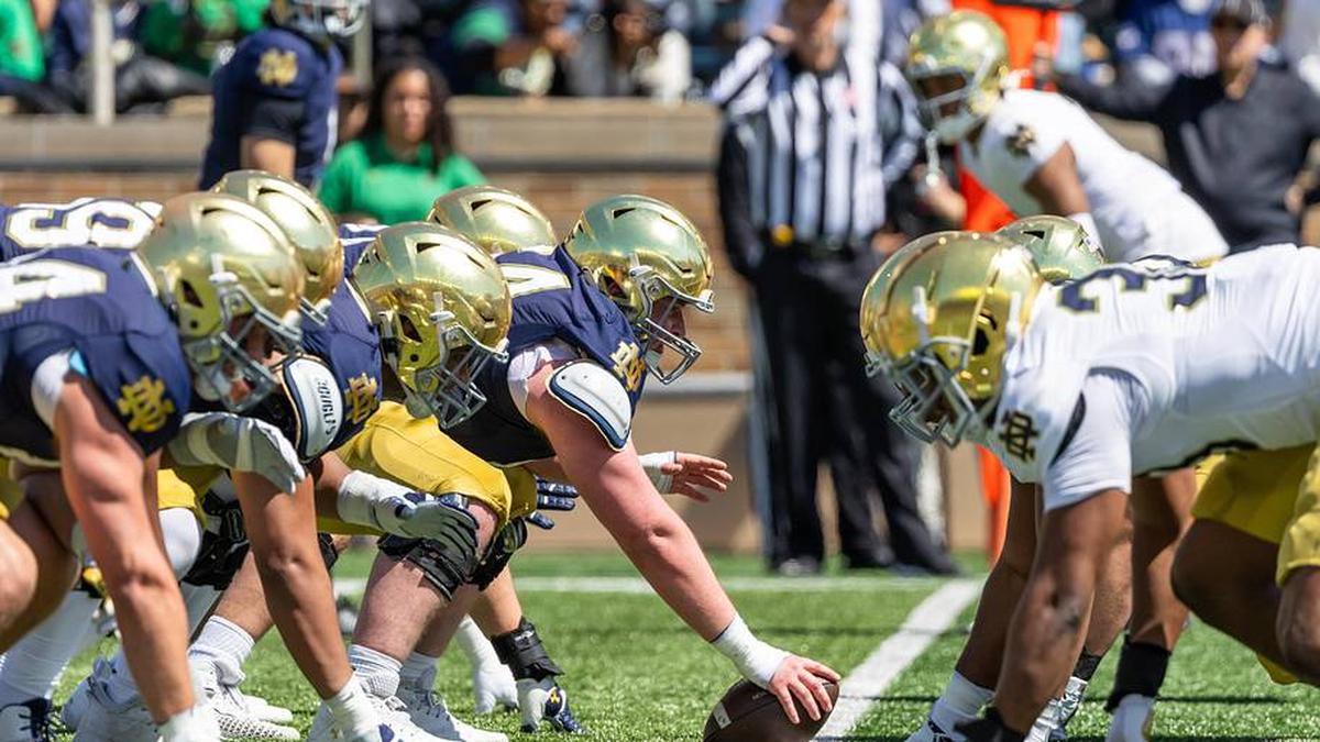  Apr 12, 2025; Notre Dame, IN, USA; Notre Dame offensive (left) and defensive (right) players line up during the Blue-Gold game at Notre Dame Stadium. Mandatory Credit: Michael Caterina-Imagn Images | Michael Caterina-Imagn Images 