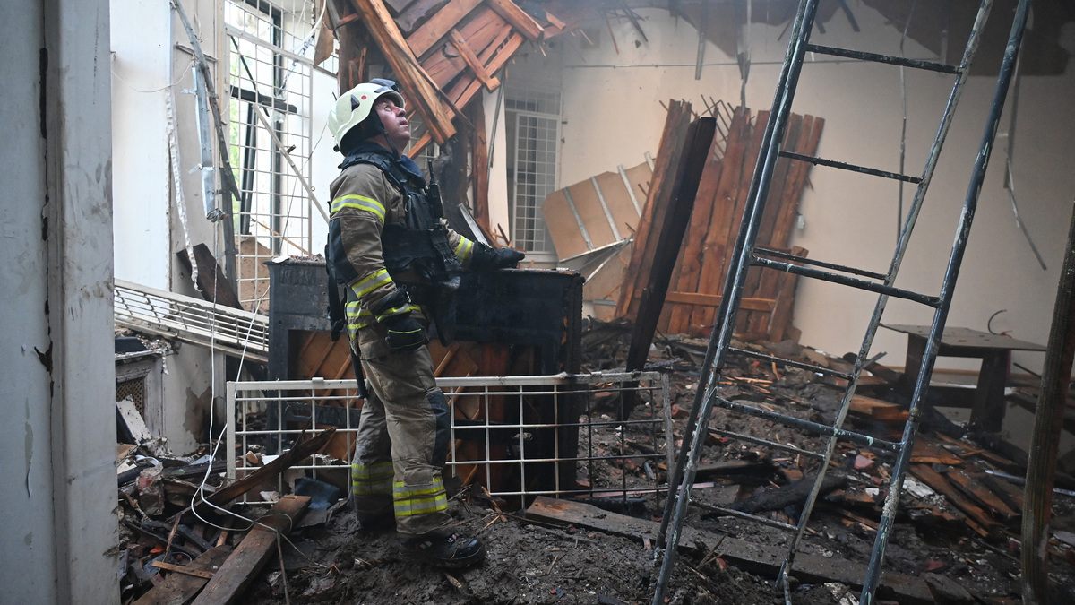 A firefighter works in the damaged Kharkiv Art Museum following a drone strike in Kharkiv, Ukraine, on June 14, 2026, amid the Russian invasion of Ukraine. (Sergey Bobok/AFP/Getty Images/TNS)