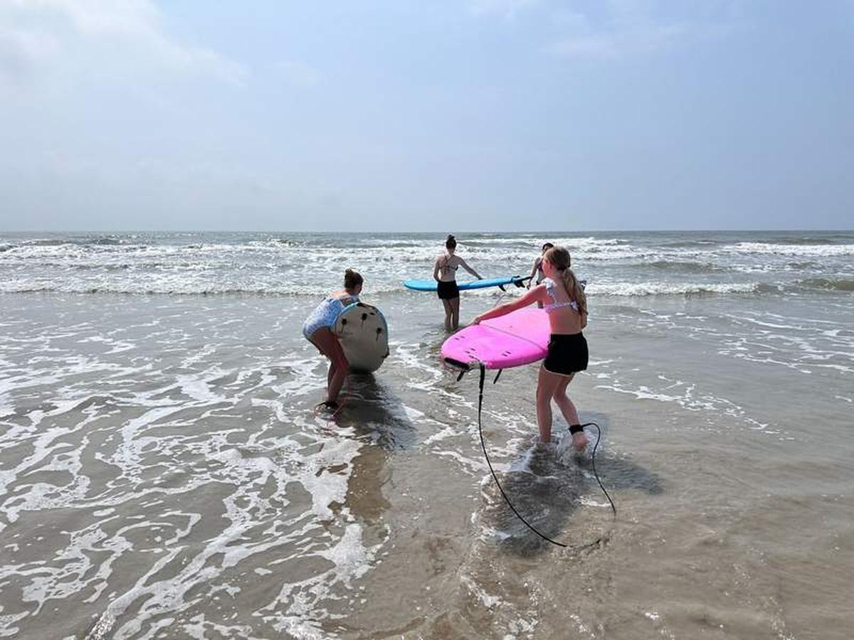  Don’t miss out on taking surf lessons in Port Aransas. Such a fun experience. Photo credit: Breeze Leonard 
