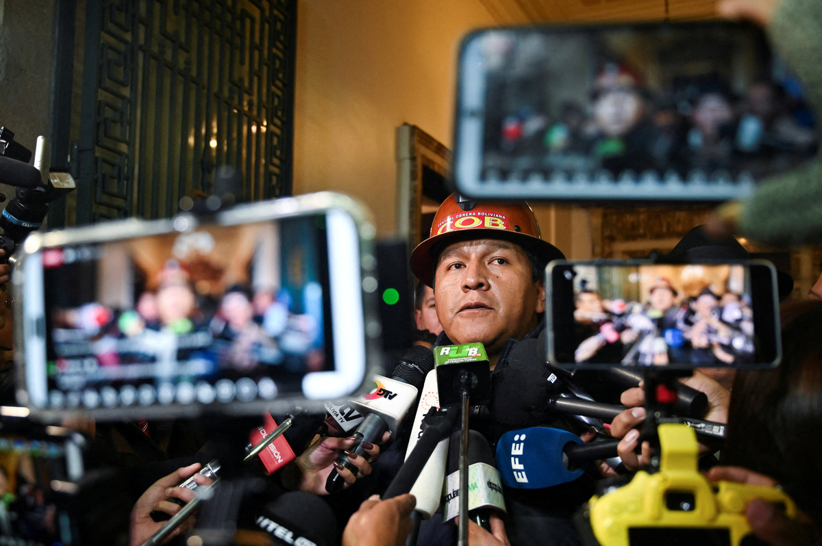 Mario Argollo, executive secretary of the Bolivian Workers' Confederation (COB), speaks with the media following a meeting with Bolivian President Rodrigo Paz, where an agreement was reached with the COB, a step toward resolving a conflict that has paralyzed the country for 50 days, in La Paz, Bolivia, June 19, 2026. REUTERS/Claudia Morales