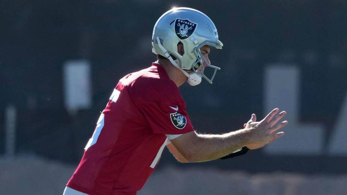  Jun 9, 2026; Henderson, NV, USA; Las Vegas Raiders quarterback Fernando Mendoza (15) takes the snap during organized team activities at Intermountain Health Performance Center. Mandatory Credit: Kirby Lee-Imagn Images | Kirby Lee-Imagn Images 