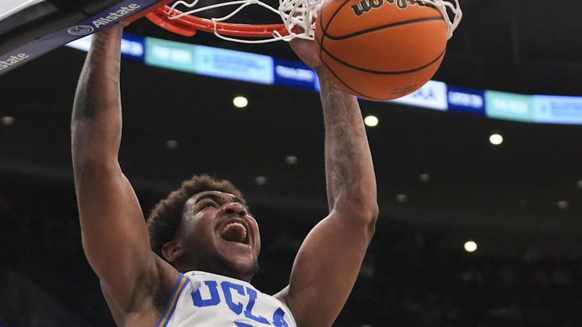  Mar 14, 2026; Chicago, IL, USA; UCLA Bruins guard Brandon Williams (5) dunks the ball against the Purdue Boilermakers during the second half at United Center. Mandatory Credit: David Banks-Imagn Images | David Banks-Imagn Images 