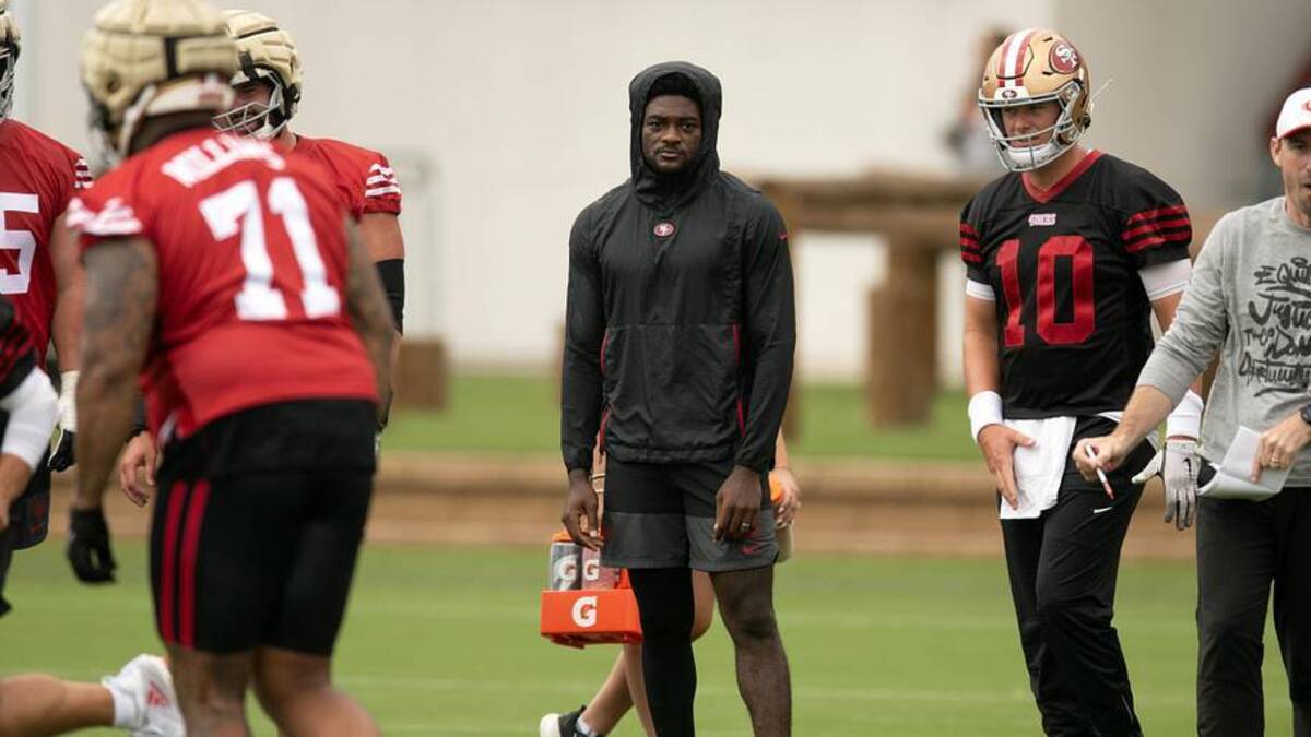  Jul 24, 2025; Santa Clara, CA, USA; San Francisco 49ers wide receiver Brandon Aiyuk (in black hoodie) watches his teammates work out during the second day of training camp. Mandatory Credit: D. Ross Cameron-Imagn Images | D. Ross Cameron-Imagn Images 