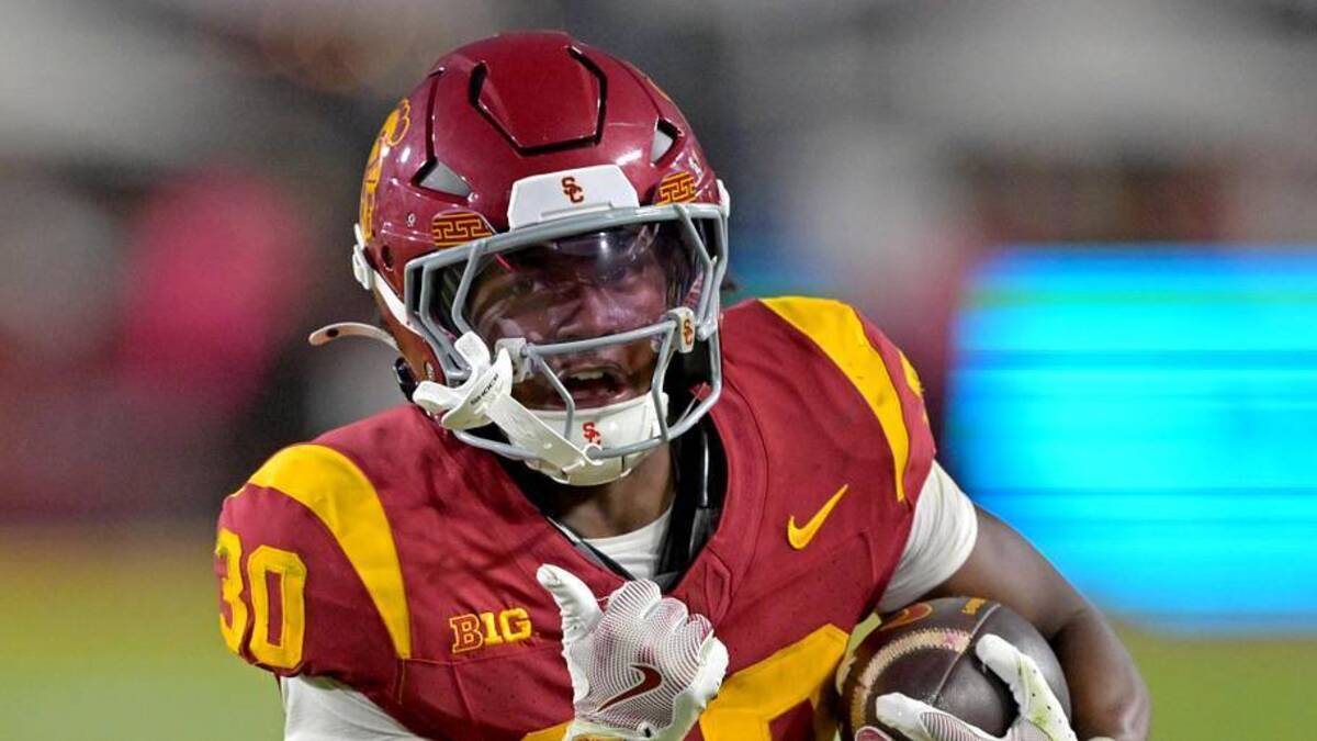  Oct 11, 2025; Los Angeles, California, USA; USC Trojans running back King Miller (30) runs for a touchdown in the second half against the Michigan Wolverines at United Airlines Field at the Los Angeles Memorial Coliseum. Mandatory Credit: Jayne Kamin-Oncea-Imagn Images | Jayne Kamin-Oncea-Imagn Images 