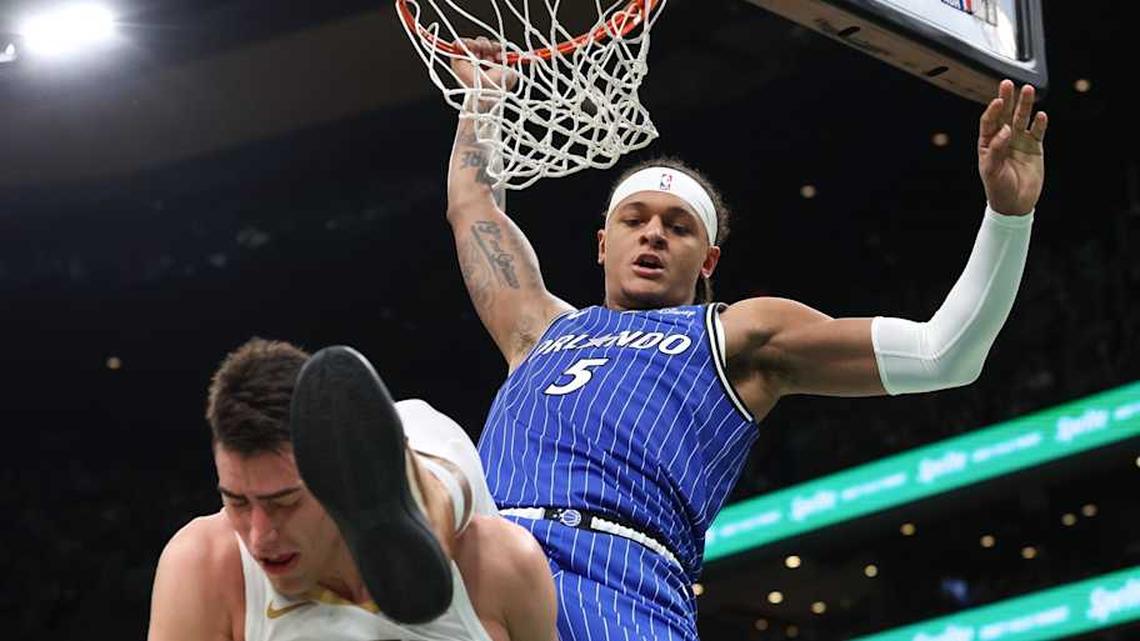  Orlando Magic forward Paolo Banchero dunks the ball against the Boston Celtics. | Paul Rutherford-Imagn Images 
