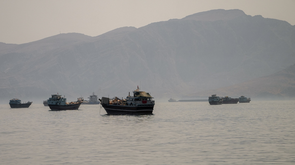 Vessels are anchored in the Strait of Hormuz, as seen from Musandam, Oman, June 19, 2026. REUTERS/Stringer
