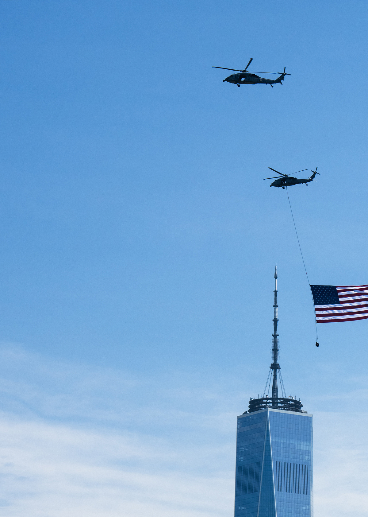 A helicopter flies above New York for the boat parade July 4, 2026. America celebrates the 250th anniversary of its independence today, with people from one end of the country to the other marking the milestone with fireworks, parades and concerts. (Juan Arredondo/The New York Times)