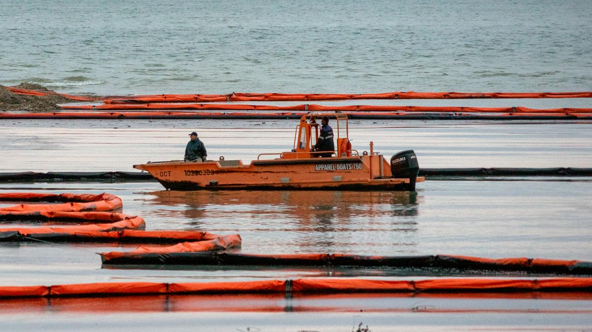 Workers set up barriers to prevent petroleum products from flowing into the Black Sea from the river following a spill caused by a recent drone attack on the Tuapse oil refinery in Tuapse, Krasnodar region on April 29, 2026, amid the ongoing Russian-Ukrainian conflict. (AFP/Getty Images/TNS)