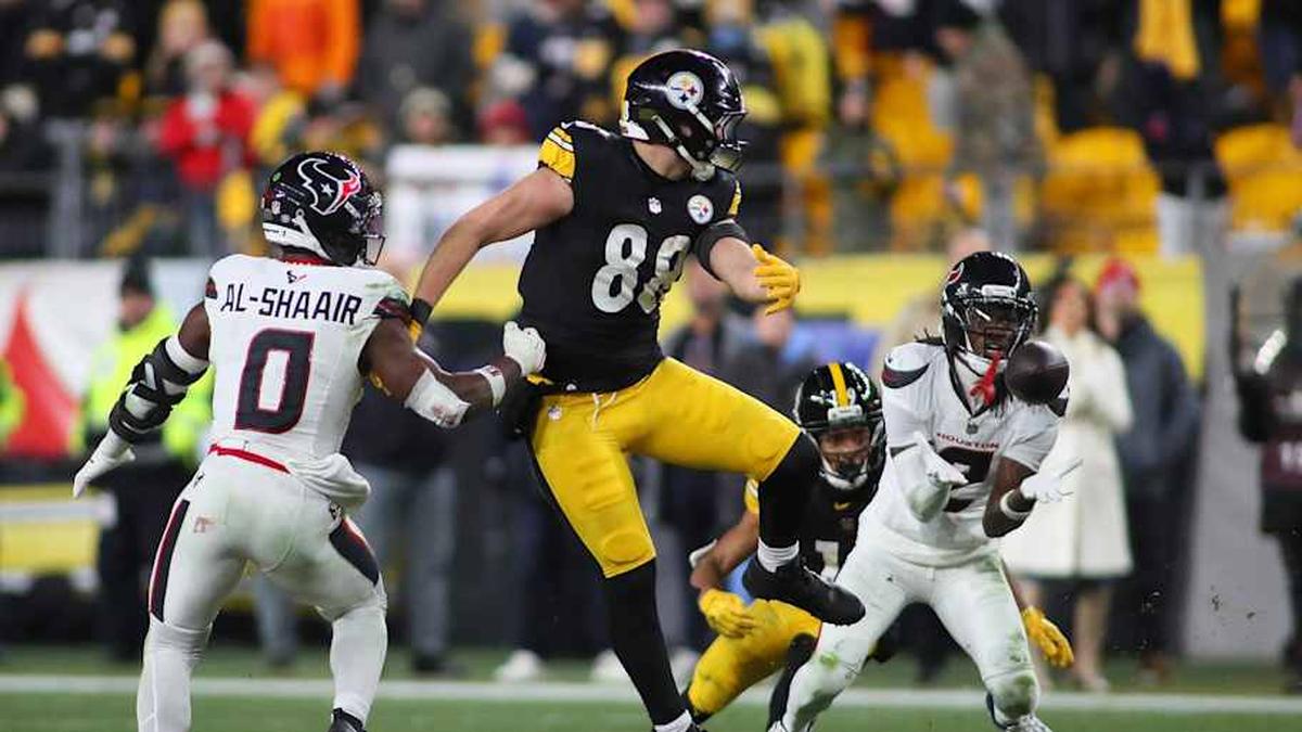  Houston Texans safety Calen Bullock (2) intercepts a pass intended for Pittsburgh Steelers tight end Pat Freiermuth (88) during the second half of the NFL Wild Card game at Acrisure Stadium in Pittsburgh, PA on January 12, 2026. | Michael Longo/For USA Today Network-PA / USA TODAY NETWORK via Imagn Images 