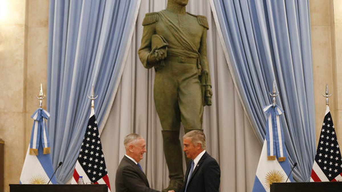 U.S. Secretary of Defense Jim Mattis, left, and Argentina’s Defense Minister Oscar Raul Aguad shake hands in Buenos Aires, Argentina Wednesday, Aug. 15, 2018. Mattis is on an official visit to several South American countries.