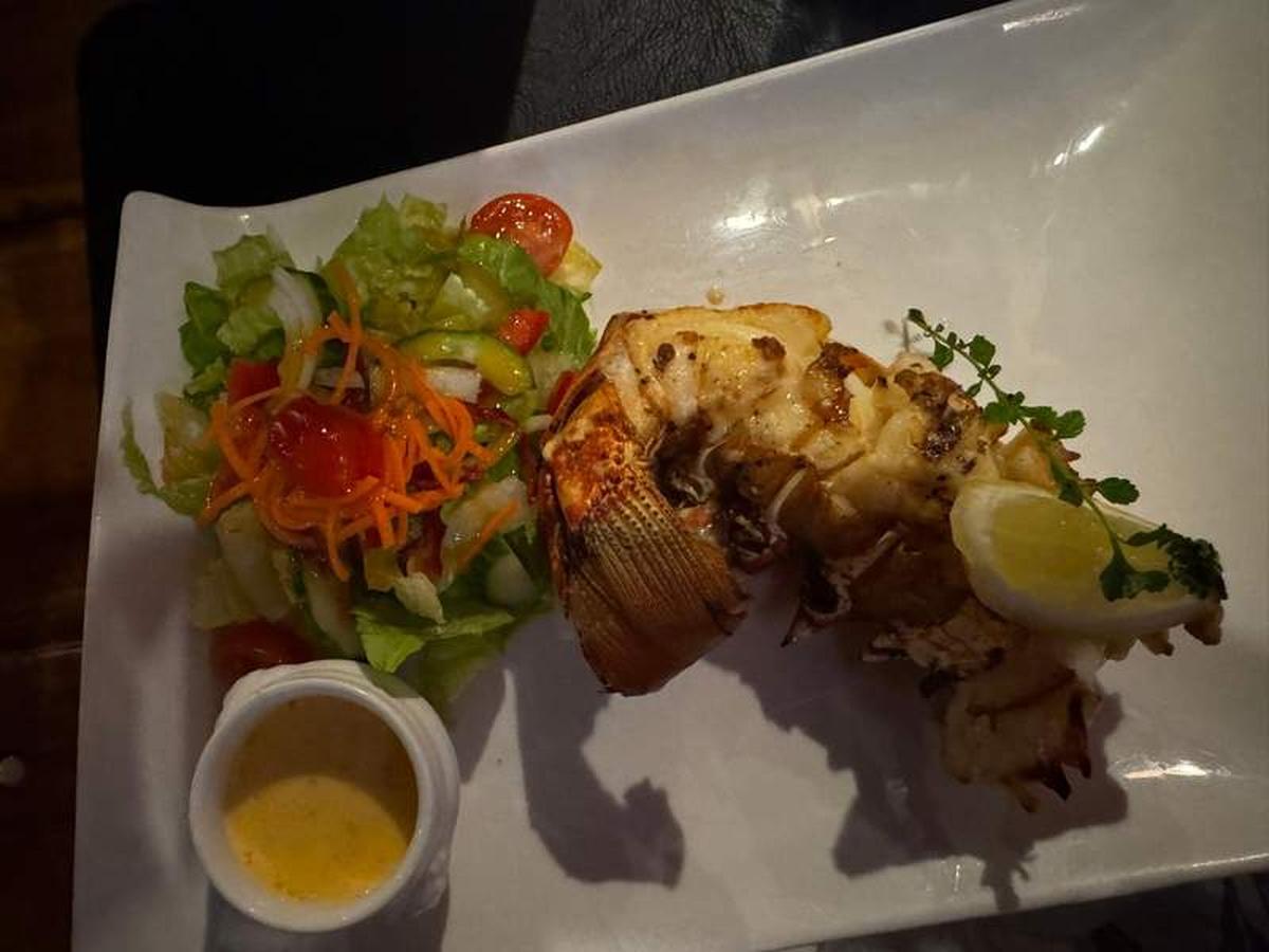  Saba is known for its fresh year round lobster and seafood like the lobster tail at Brigadoon. Photo credit: Emily Molina 
