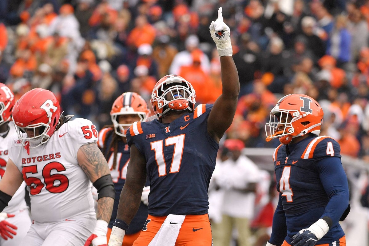  Nov 1, 2025; Champaign, Illinois, USA; Illinois Fighting Illini linebacker Gabe Jacas (17) celebrates his sack on Rutgers Scarlet Knights quarterback Athan Kaliakmanis (16) during the first half at Memorial Stadium. Mandatory Credit: Ron Johnson-Imagn Images