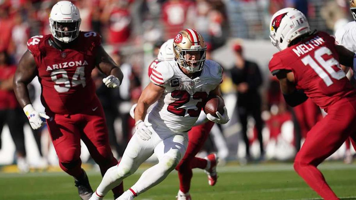  Sep 21, 2025; Santa Clara, California, USA; San Francisco 49ers running back Christian McCaffrey (23) carries the ball against the Arizona Cardinals during the second half at Levi's Stadium. Mandatory Credit: Cary Edmondson-Imagn Images | Cary Edmondson-Imagn Images 