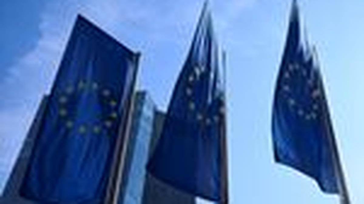 FILE PHOTO: European Union flags flutter outside the European Central Bank (ECB) headquarters in Frankfurt, Germany, March 19, 2026. REUTERS/Jana Rodenbusch/File Photo