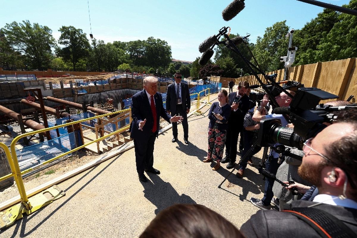 U..S. President Donald Trump speaks to the media at the site of ongoing construction of the planned White House ballroom in Washington, D.C., U.S., May 19, 2026. REUTERS/Kevin Lamarque