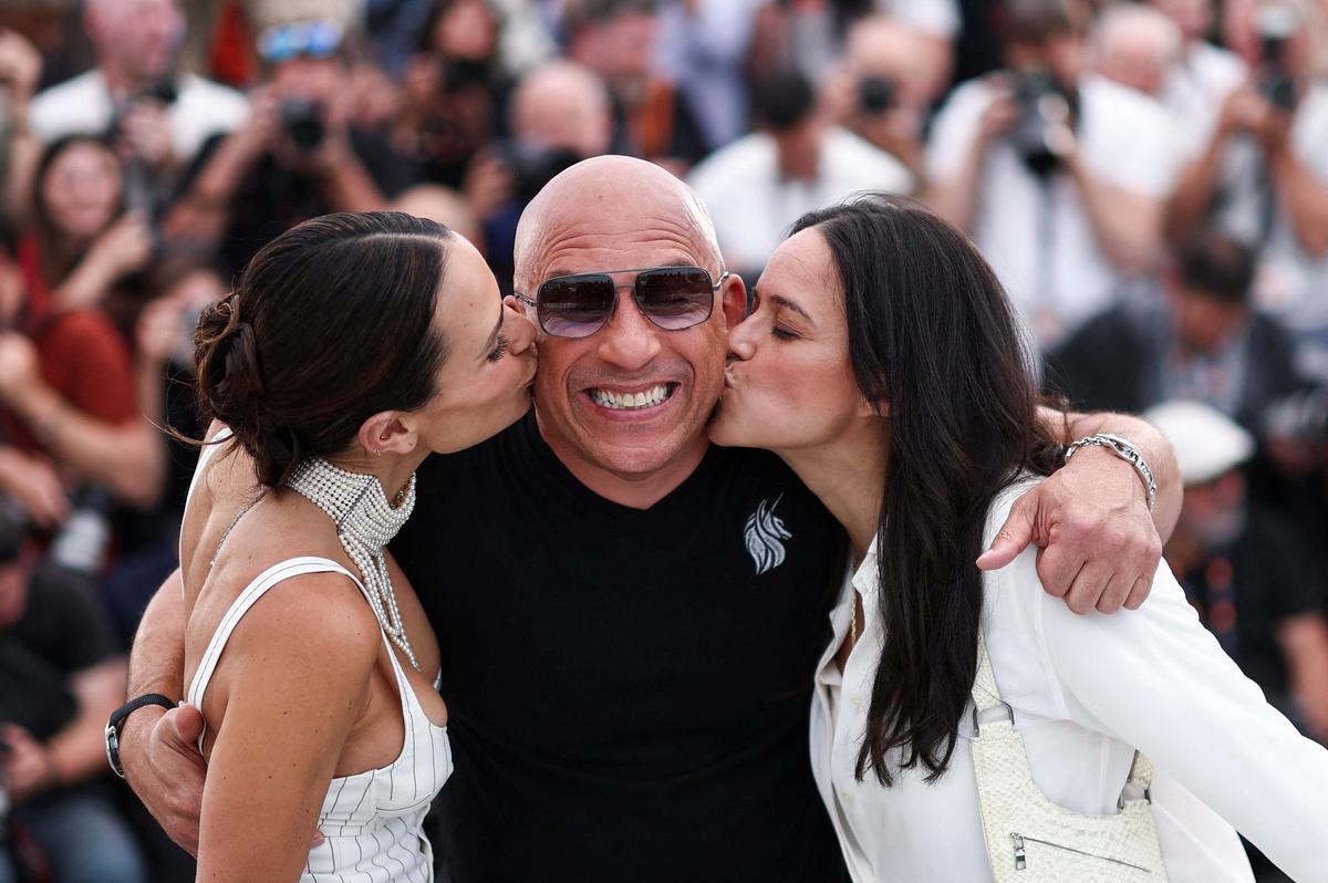 Cast members Vin Diesel, Michelle Rodriguez and Jordana Brewster attend a photocall before a Special Screening to celebrate the 25th anniversary of "The Fast and the Furious" franchise at the 79th Cannes Film Festival in Cannes, France, May 13, 2026. REUTERS/Gonzalo Fuentes