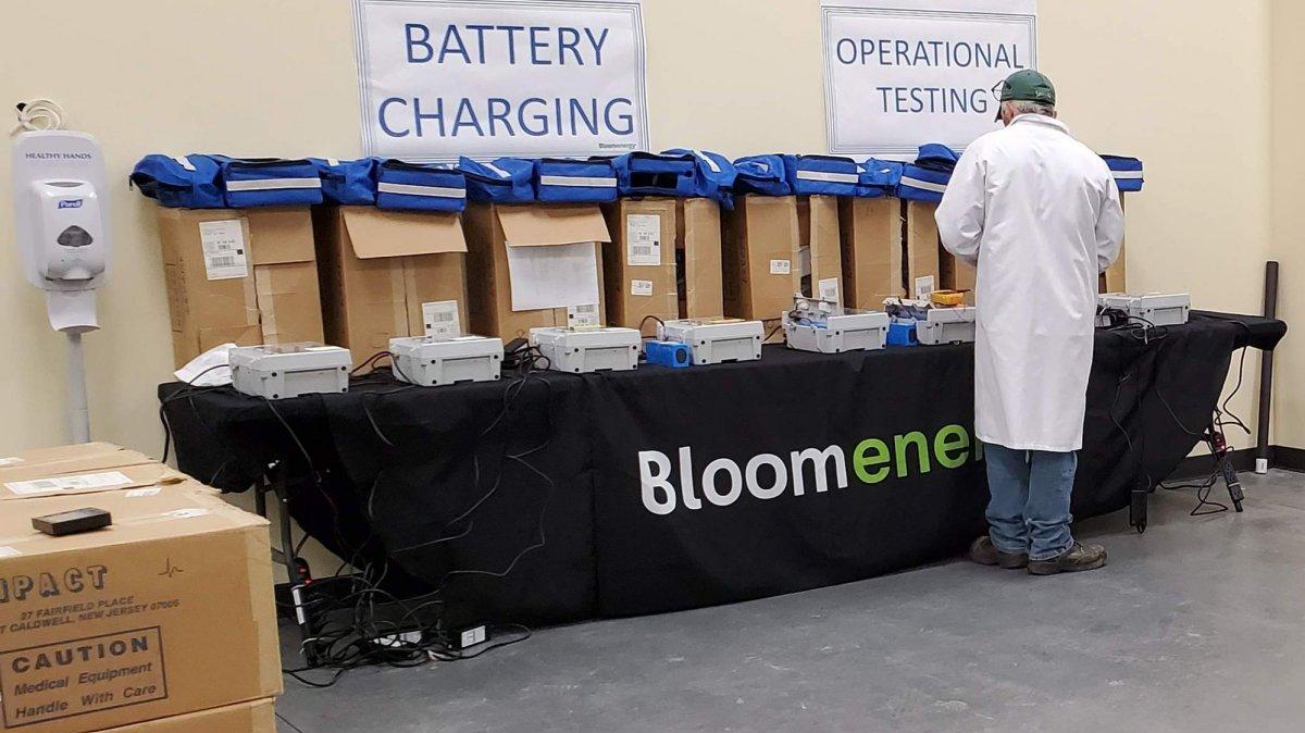 A Bloom Energy employee sets up Impact Ventilators for a 16-hour charge at the company's facility in Newark, Delaware. File. Photo courtesy Bloom Energy/UPI