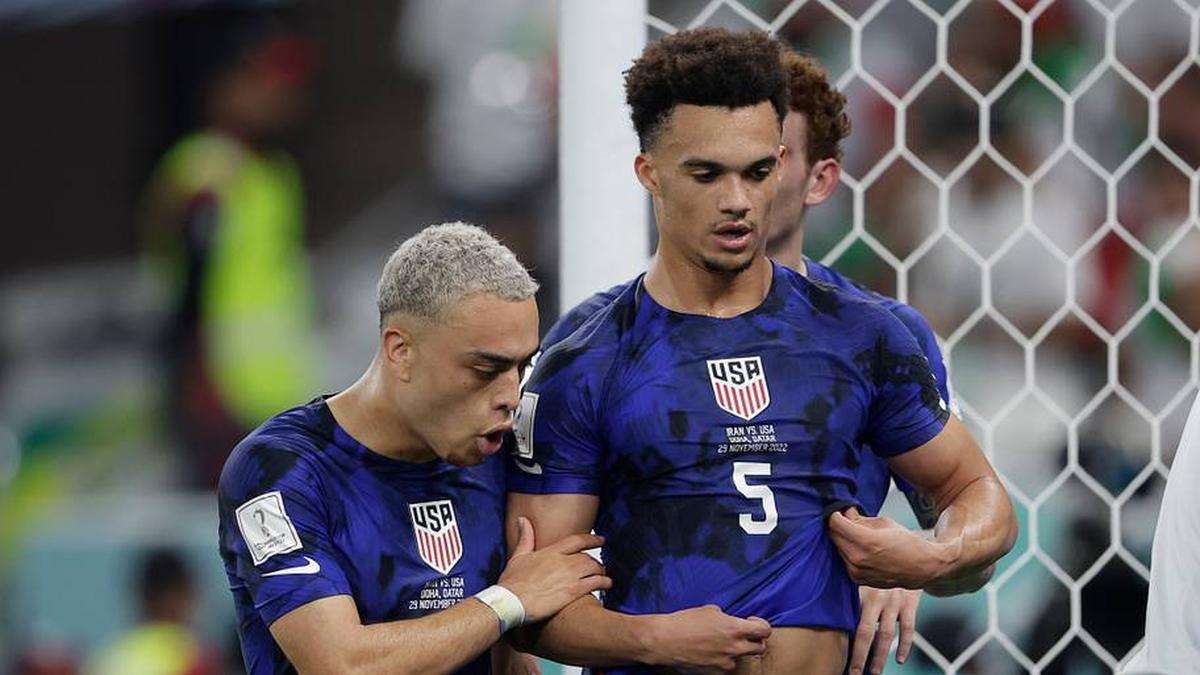 Sergiño Dest (left) and Antonee Robinson (right) started for the USMNT at the 2022 World Cup in Qatar | Rico Brouwer/Soccrates/Getty Images 