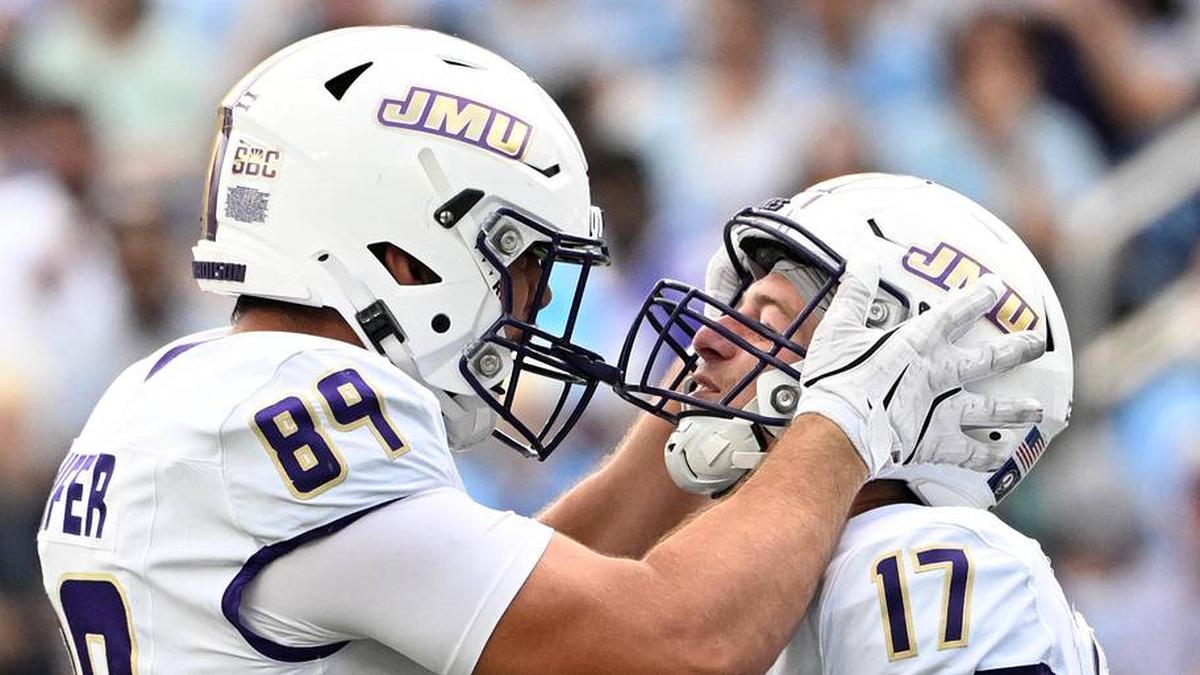 Sep 21, 2024; Chapel Hill, North Carolina, USA; James Madison Dukes tight end Taylor Thompson (17) reacts with tight end Josh Phifer (89) after scoring a touchdown in the second quarter at Kenan Memorial Stadium. Mandatory Credit: Bob Donnan-Imagn Images | Bob Donnan-Imagn Images 