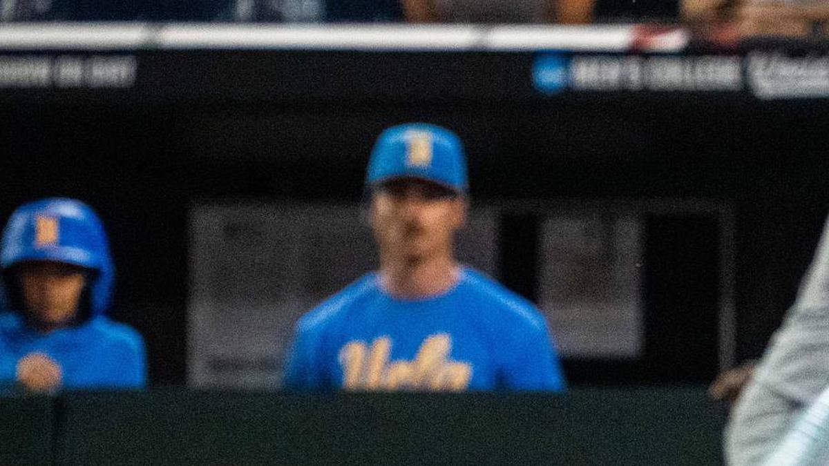  Jun 17, 2025; Omaha, Neb, USA; UCLA Bruins center fielder Payton Brennan (11) hits a RBI single against the Arkansas Razorbacks during the ninth inning at Charles Schwab Field. Mandatory Credit: Dylan Widger-Imagn Images | Dylan Widger-Imagn Images 