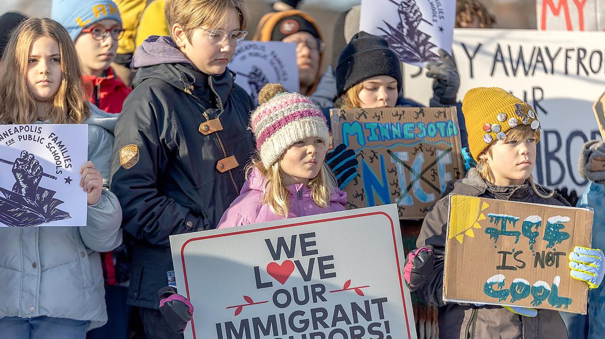 Minneapolis Public Schools students hold signs during a news conference held by their parents on Jan. 9, 2026. (Elizabeth Flores/The Minnesota Star Tribune/TNS)