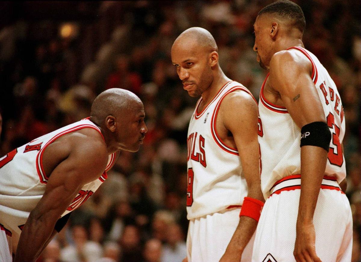  7 Jun 1996: Michael Jordan of the Chicago Bull, left, discusses strategy with teammates Ron Harper, center, and Scottie Pippen during a time-out on the court during the fourth quarter of game two in the NBA Finals at the United Center in Chicago, Illino 