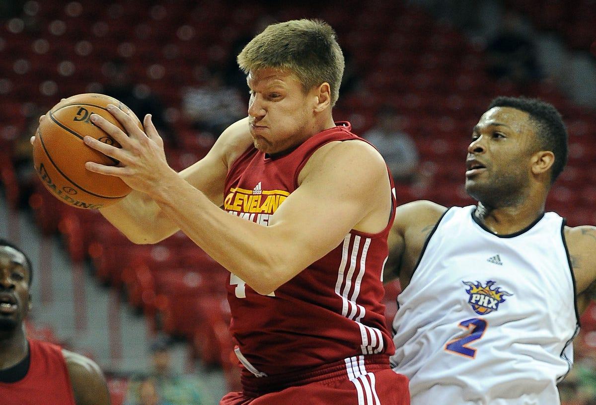 July 17, 2012; Las Vegas, NV, USA;  Cleveland Cavaliers forward Luke Harangody (44) grabs a rebound in front of Phoenix Suns forward PJ Tucker (2) during the game at the Thomas and Mack Center. Mandatory Credit: Jayne Kamin-Oncea-USA TODAY Sports