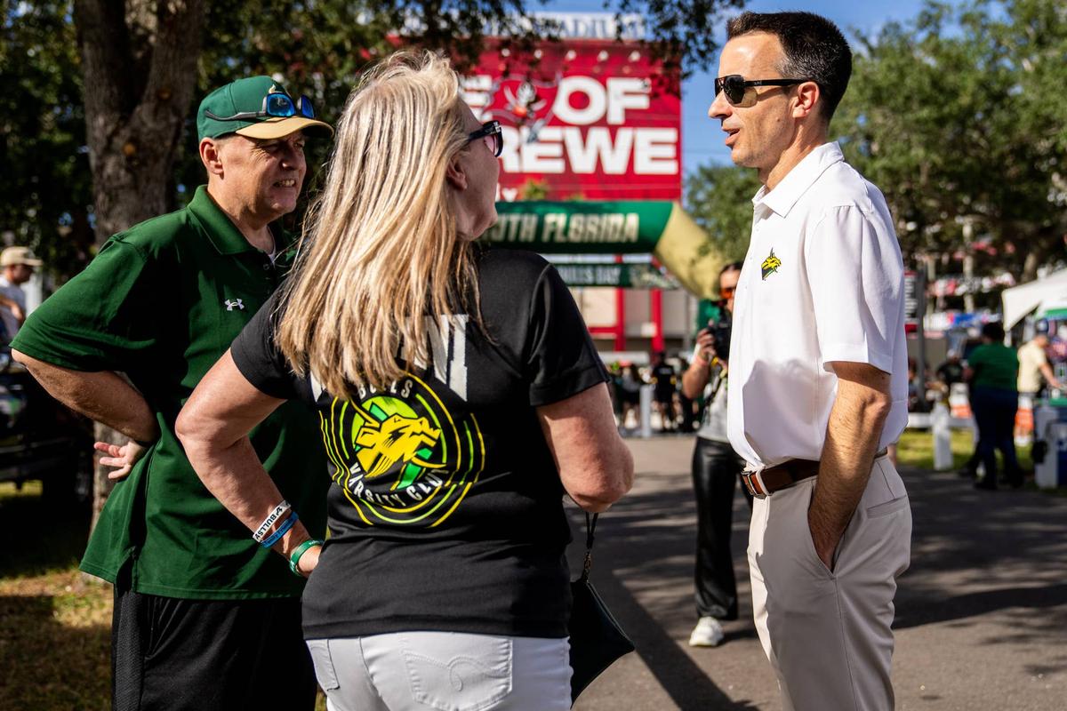  USF CEO of athletics Rob Higgins speaks with Bulls fans prior to USF's football game against Charlotte on Oct. 3, 2025. USF athletics photo