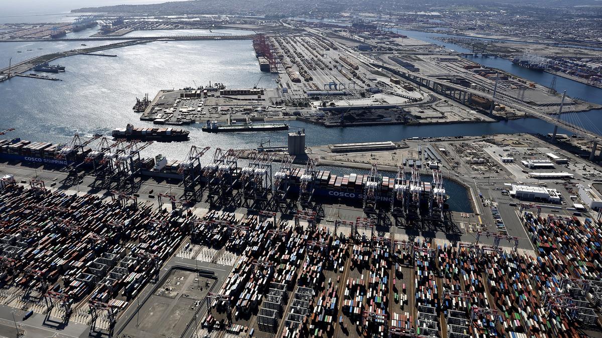 An aerial view of shipping containers at the Port Of Long Beach (bottom) on April 3, 2025, in Long Beach, Calif. (Mario Tama/Getty Images/TNS)
