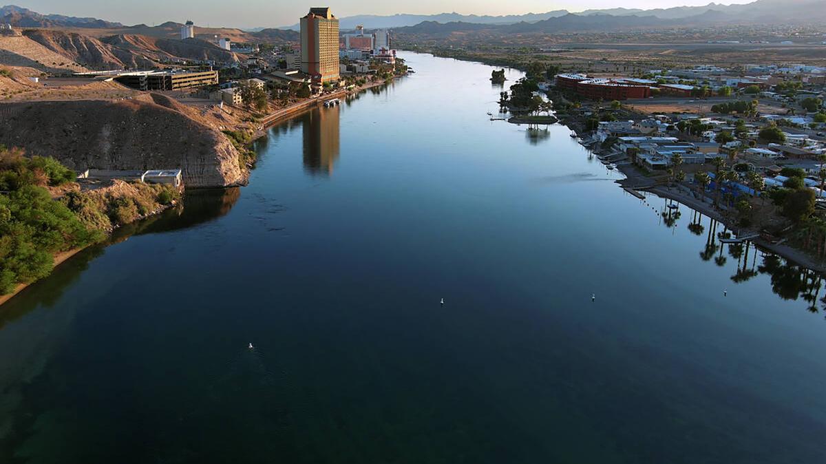 The Colorado River flows past Laughlin, Nevada, left, and Bullhead City, Arizona, on May 12, 2023. (Sam Morris/Las Vegas Review-Journal/TNS)