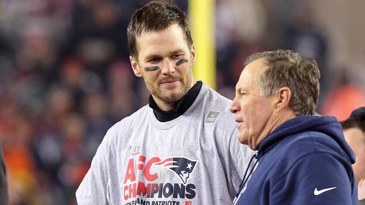  Jan 22, 2017; Foxborough, MA, USA; New England Patriots quarterback Tom Brady (L) talks with Patriots head coach Bill Belichick (R) on the victory podium after the Patriots defeated the Pittsburgh Steelers in the 2017 AFC Championship Game at Gillette Stadium. Mandatory Credit: Geoff Burke-Imagn Images | Geoff Burke-Imagn Images 