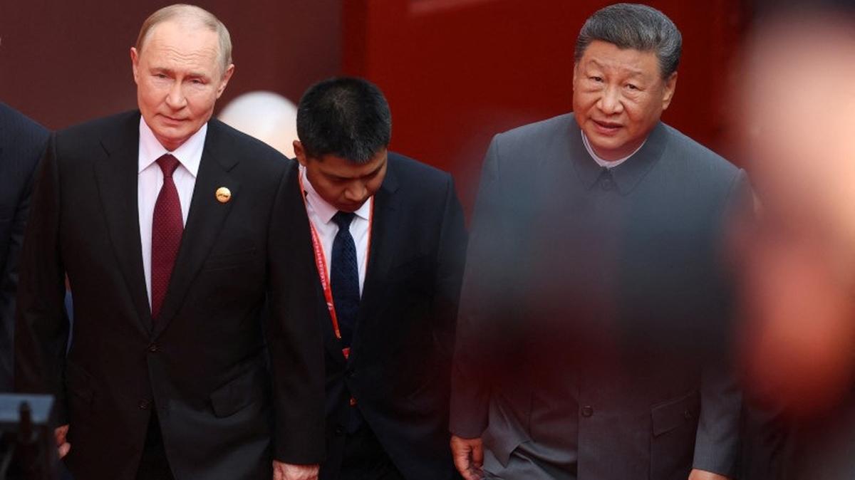 Russian President Vladimir Putin and Chinese President Xi Jinping arrive for a military parade marking the 80th anniversary of the end of World War Two, in Beijing, China September 3, 2025. Sputnik/Alexander Kazakov/Pool via REUTERS