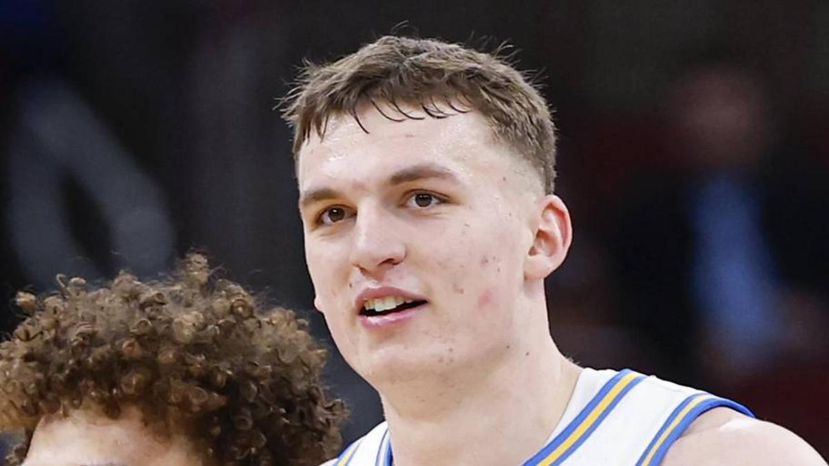  Mar 12, 2026; Chicago, IL, USA; UCLA Bruins guard Trent Perry (0) and forward Tyler Bilodeau (34) smile during the second half at United Center. Mandatory Credit: Kamil Krzaczynski-Imagn Images | Kamil Krzaczynski-Imagn Images 