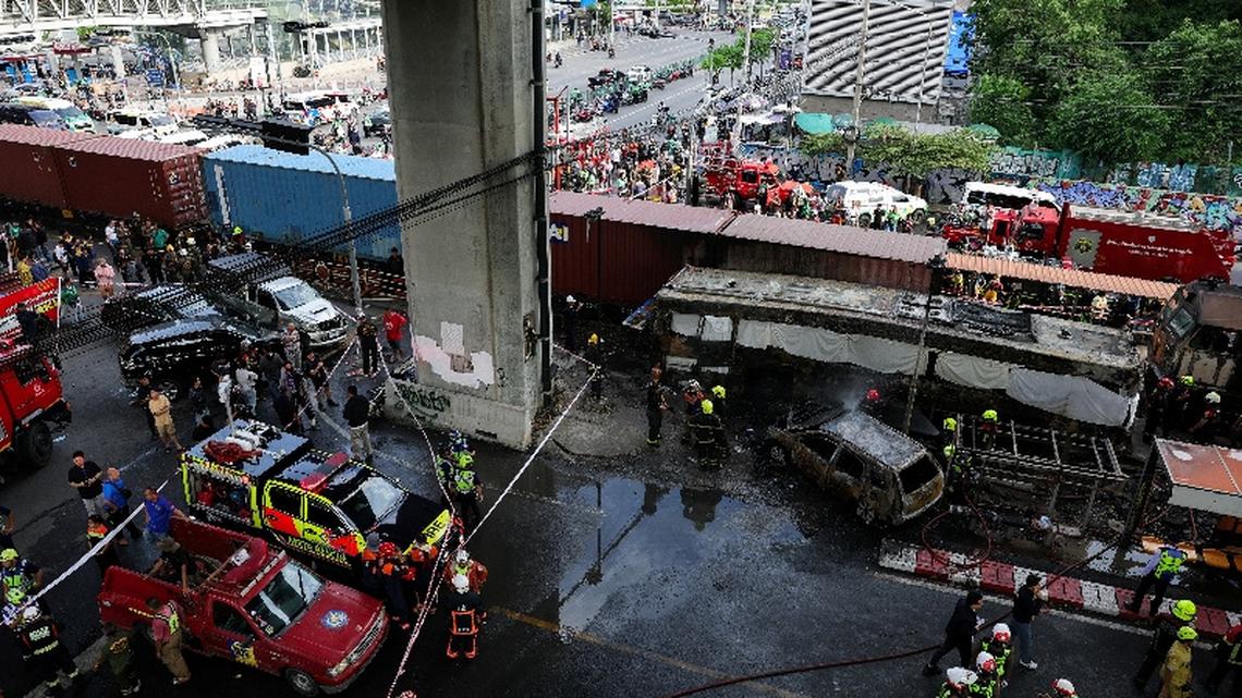 At least eight dead, 25 injured in train collision that sparks bus fire in Thailand 