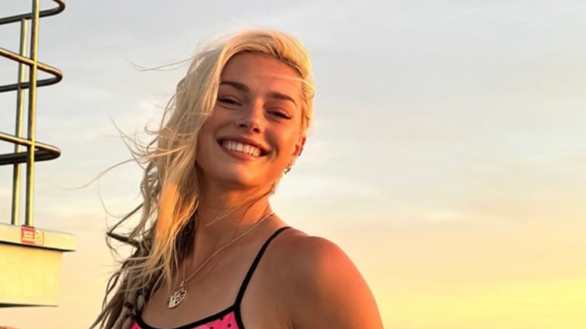 'Stunning' Olympian Causes Stir With Her Pink Swimsuit Photo 