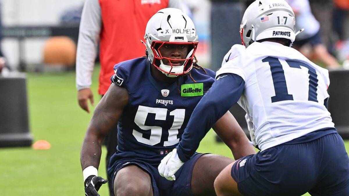  May 9, 2026; Foxborough, MA, USA; New England Patriots defensive end Xavier Holmes (51) does a drill with tight end Jeremiah Franklin (17) during the New England Patriots rookie camp at Gillette Stadium. Mandatory Credit: Eric Canha-Imagn Images | Eric Canha-Imagn Images 