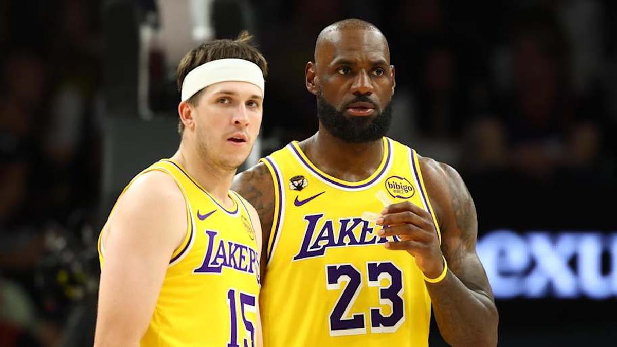  Austin Reaves and LeBron James | Mark J. Rebilas-Imagn Images 