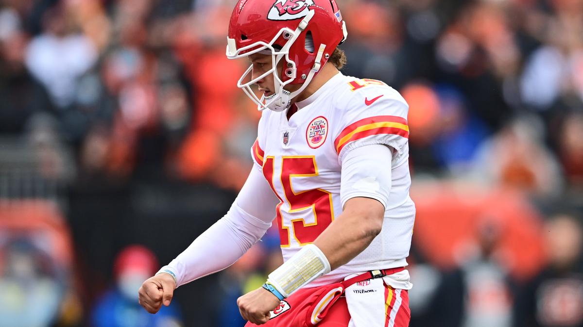 Kansas City Chiefs quarterback Patrick Mahomes (15) celebrates a 1-yard touchdown by running back Darrel Williams during the first half of an NFL football game against the Cincinnati Bengals, Sunday, Jan. 2, 2022, in Cincinnati. (AP Photo/David Dermer)