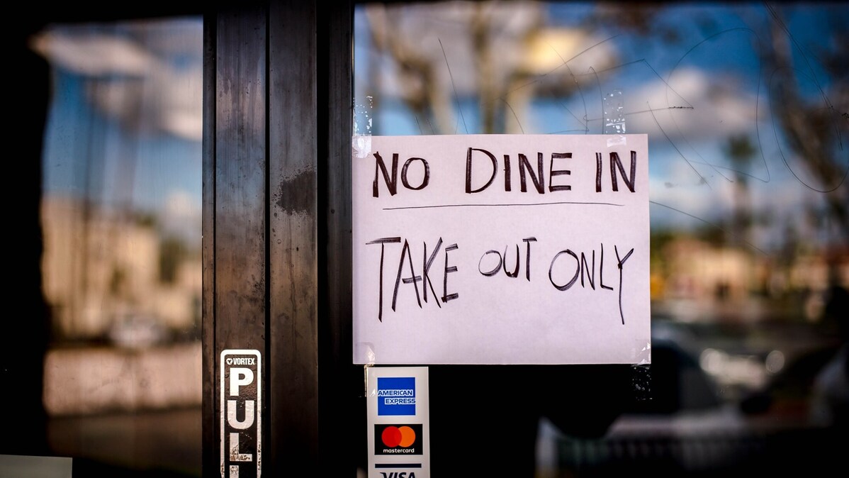 A notice is posted on the door at Rising Savor Chinese food in Riverside on Tuesday, March 17, 2020, notifying customers of disrupted the service due to outbreak of novel coronavirus (COVID-19). The City of Riverside ordered the temporary closure of restaurants dine-in service, and should be open only to drive-though or other pick-up/delivery options. (Photo by Watchara Phomicinda, The Press-Enterprise/SCNG)