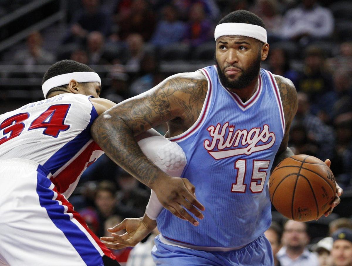 Mar 18, 2016; Auburn Hills, MI, USA; Sacramento Kings center DeMarcus Cousins (15) dribbles around Detroit Pistons forward Tobias Harris (34) during the second quarter at The Palace of Auburn Hills. Pistons win 115-108. Mandatory Credit: Raj Mehta-USA TODAY Sports