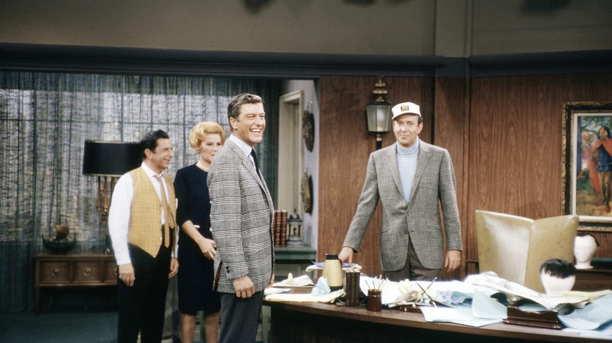 The Dick Van Dyke Show, on set in 1965, from left: Morey Amsterdam, Rose Marie, Dick Van Dyke and Carl Reiner.