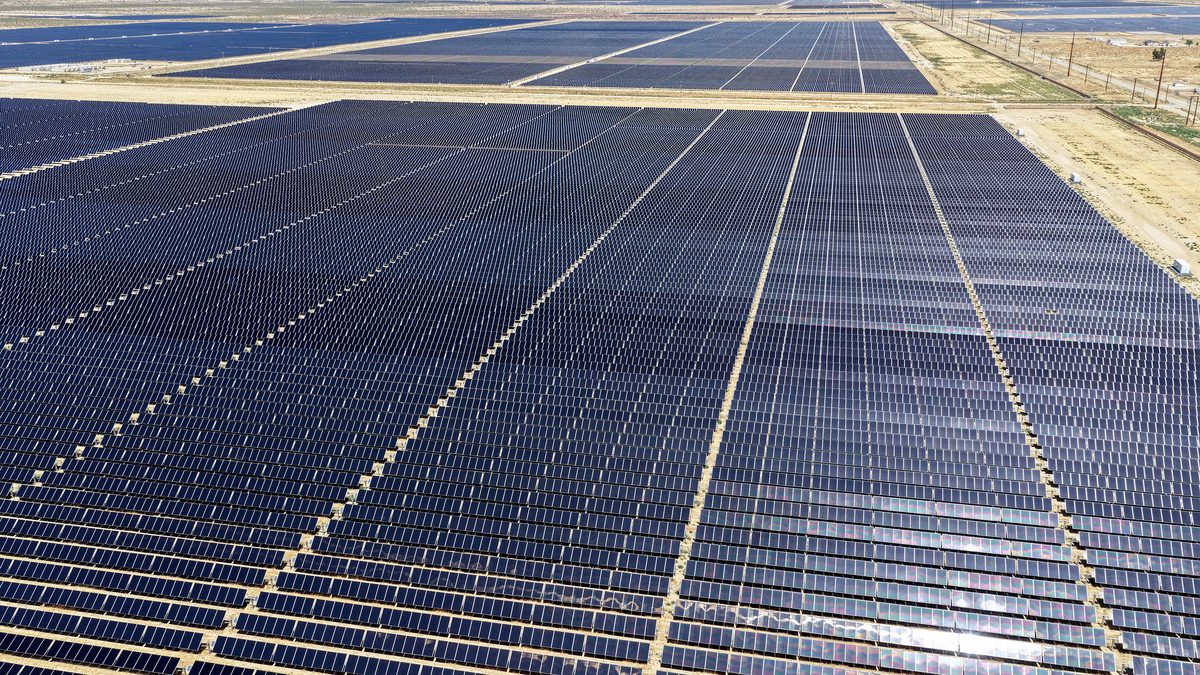An aerial view of a solar panel array at a solar farm on June 17, 2026 near Rosamond, California. For the first time in U.S. history, solar energy outpaced coal by supplying 12.8 percent of the nation's electricity compared to coal's 12.2 percent, according to a report by clean energy think tank Ember. (Mario Tama/Getty Images/TNS)