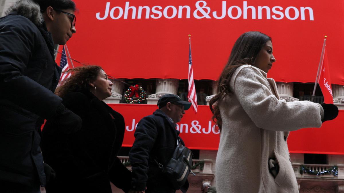 A Johnson & Johnson banner is displayed on the front of the New York Stock Exchange (NYSE) in New York City, in New York City, U.S., December 5, 2023.  REUTERS/Brendan McDermid