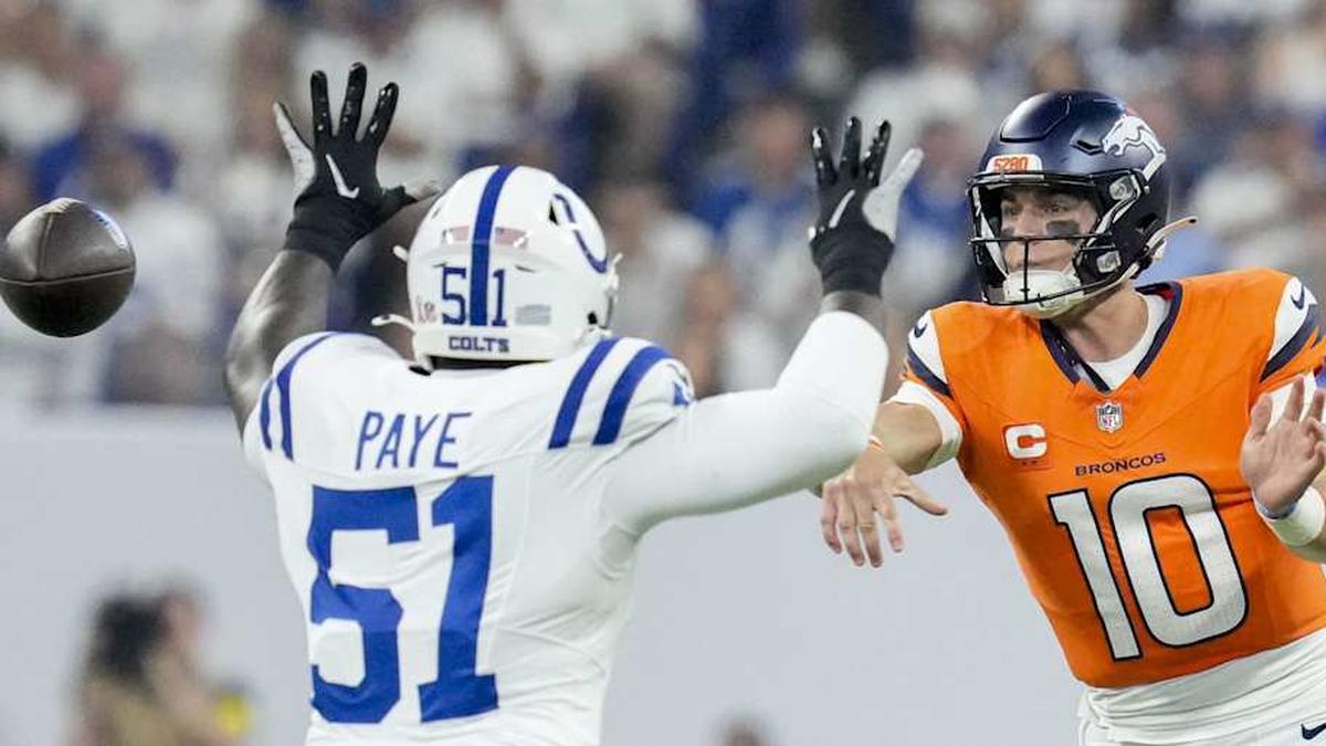  Sep 14, 2025; Indianapolis, Indiana, USA; Indianapolis Colts defensive end Kwity Paye (51) puts pressure on Denver Broncos quarterback Bo Nix (10) at Lucas Oil Stadium. Mandatory Credit: INDIANAPOLIS STAR-USA TODAY Network via Imagn Images | INDIANAPOLIS STAR-USA TODAY Network via Imagn Images 