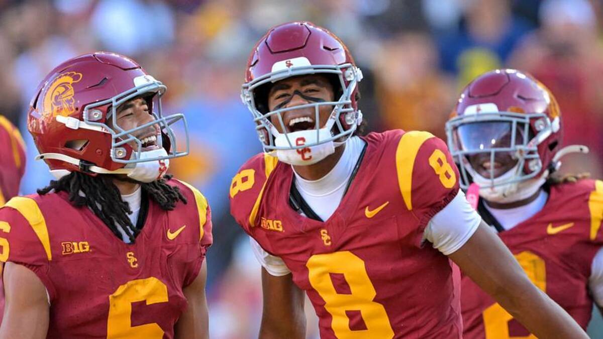  Oct 11, 2025; Los Angeles, California, USA; USC Trojans wide receiver Ja'Kobi Lane (8) is congratulated by wide receiver Makai Lemon (6) after catching a touchdown pass in the first half against the Michigan Wolverines at United Airlines Field at the Los Angeles Memorial Coliseum. Mandatory Credit: Jayne Kamin-Oncea-Imagn Images | IMAGN IMAGES via Reuters Connect 