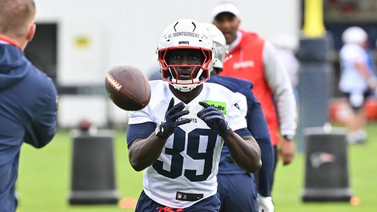  May 9, 2026; Foxborough, MA, USA; New England Patriots running back Myles Montgomery (39) catches the ball during the New England Patriots rookie camp at Gillette Stadium. Mandatory Credit: Eric Canha-Imagn Images | Eric Canha-Imagn Images 