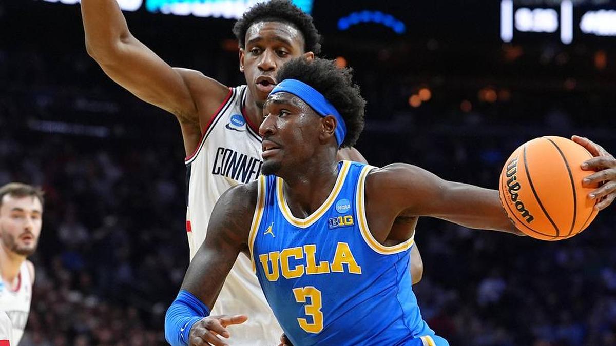  Mar 22, 2026; Philadelphia, PA, USA; UCLA Bruins forward Eric Dailey Jr. (3) dribbles the ball against the UConn Huskies in the first half during a second round game of the men's 2026 NCAA Tournament at Xfinity Mobile Arena. Mandatory Credit: Kyle Ross-Imagn Images | Kyle Ross-Imagn Images 